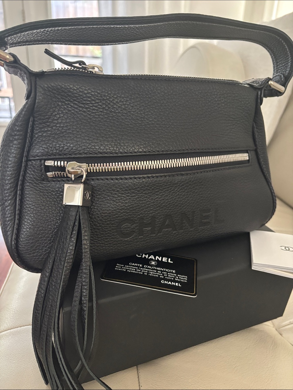 CHANEL Black Pebbled Leather Shoulder Bag with Tassel Zip